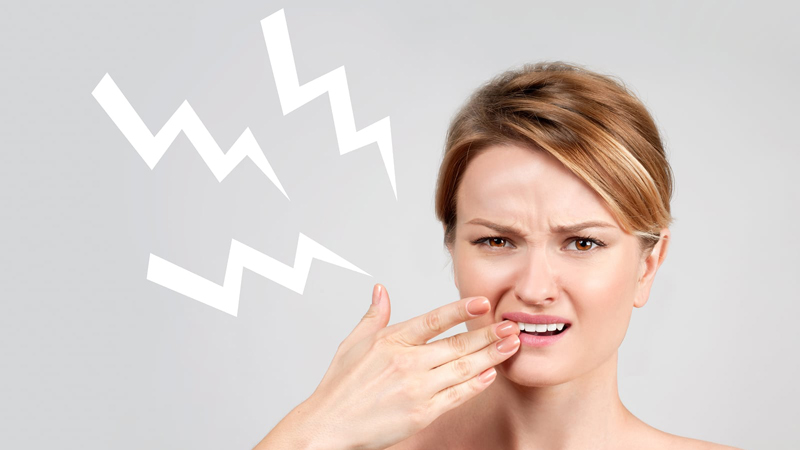 علل حساسیت دندان به گرما و سرما | بهترین جراح لثه اصفهان