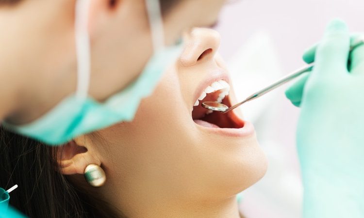 Time to visit the dentist to check the dental implant | The best dentist in Isfahan